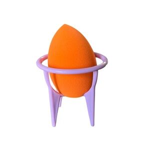 Orange Full Size Sponge Beauty Blender Open Light Purple Storage Stand Container